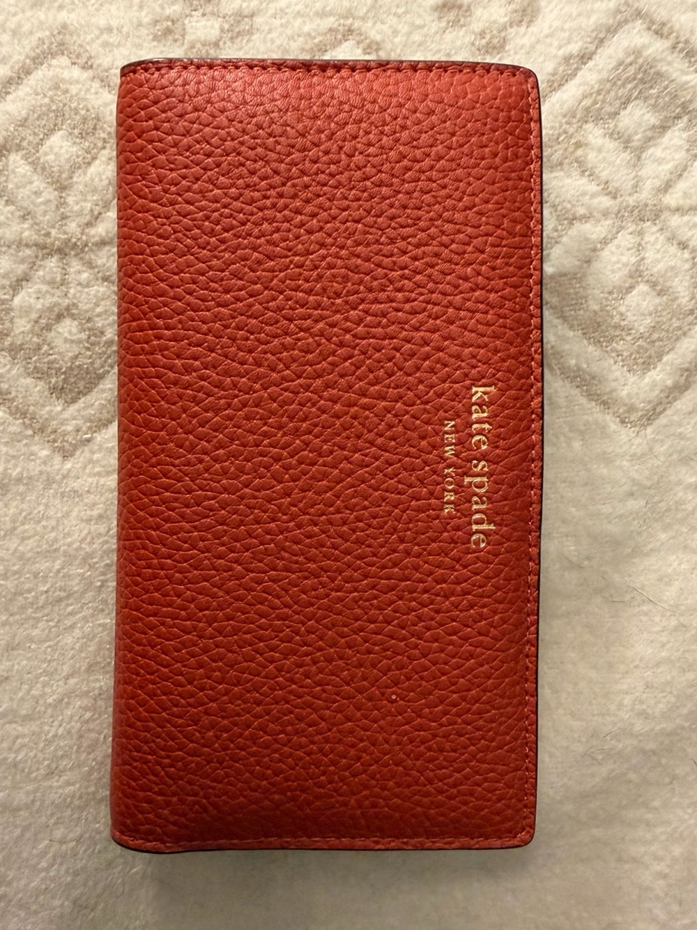 kate spade Pebbled Leather Continental Wallet in Deep Red with Gold Logo